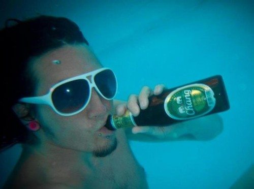 Chris Stevens drinking Chang under water