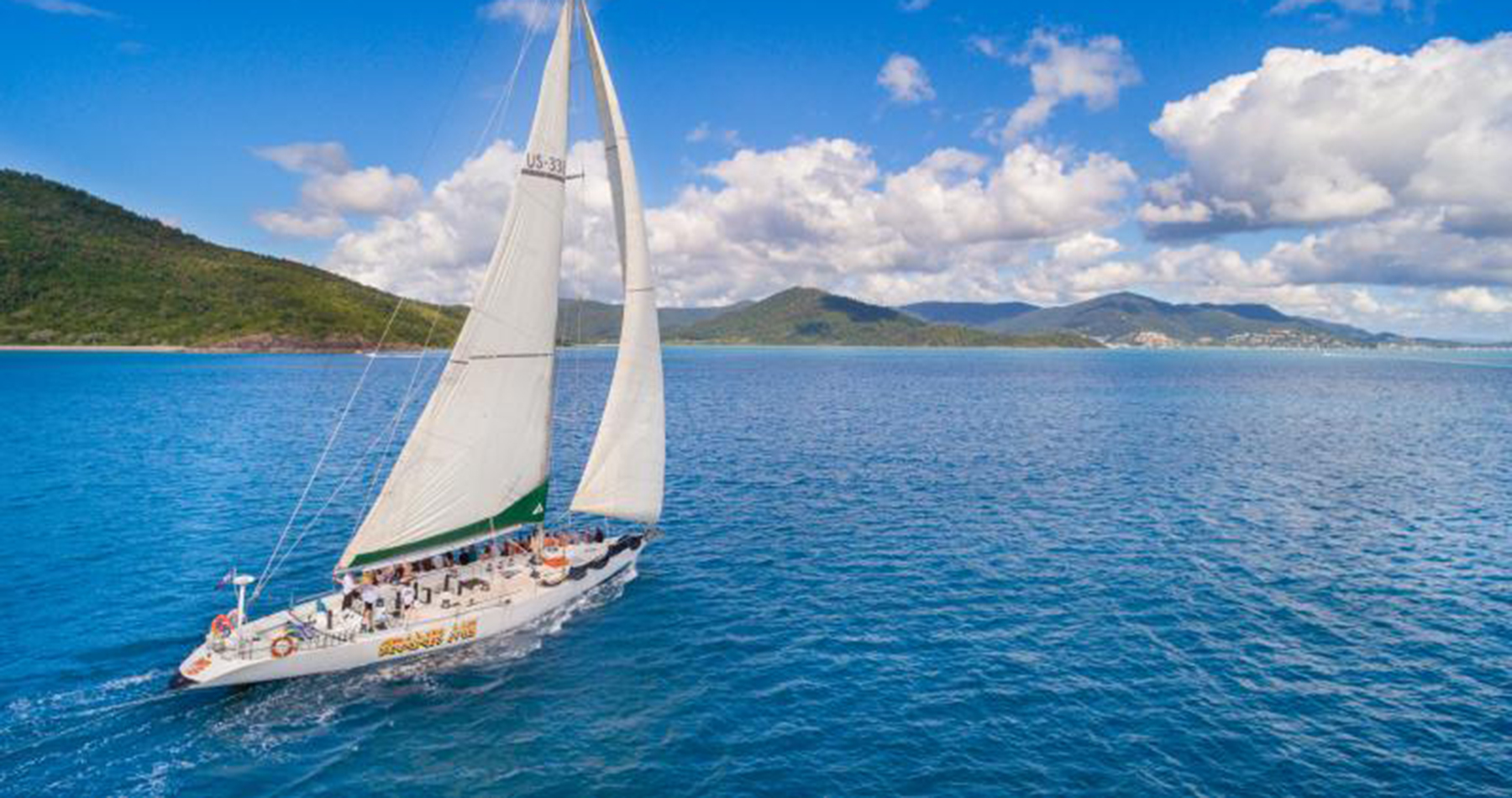 spank me whitsundays sailing adventure airlie beach australia whitehaven beach backpacker racing yacht